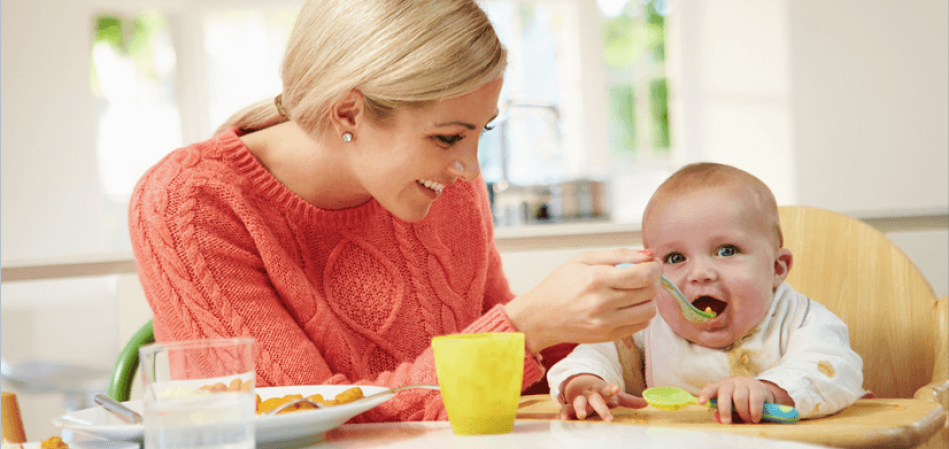 Screenshot 2024-07-31 at 16-33-28 Mother Feeding Baby Sitting in High Chair – zdjęcia od platformy Canva